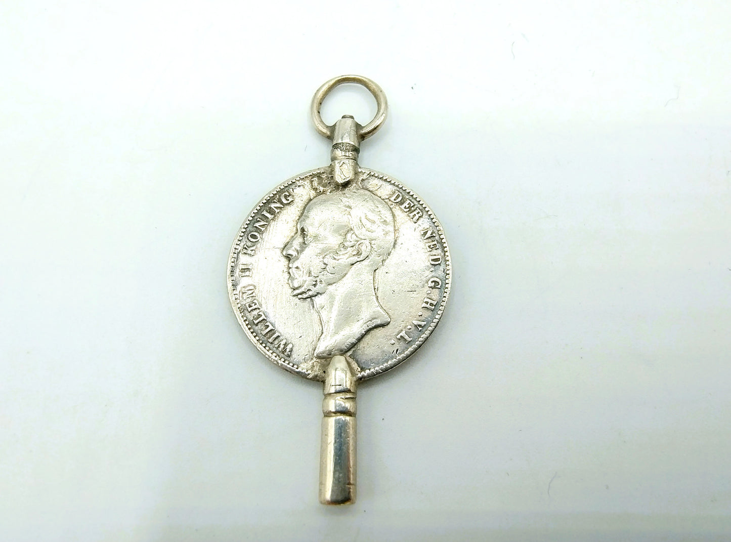 Zilveren horlogesleutel, halve gulden, Willem II, 1848