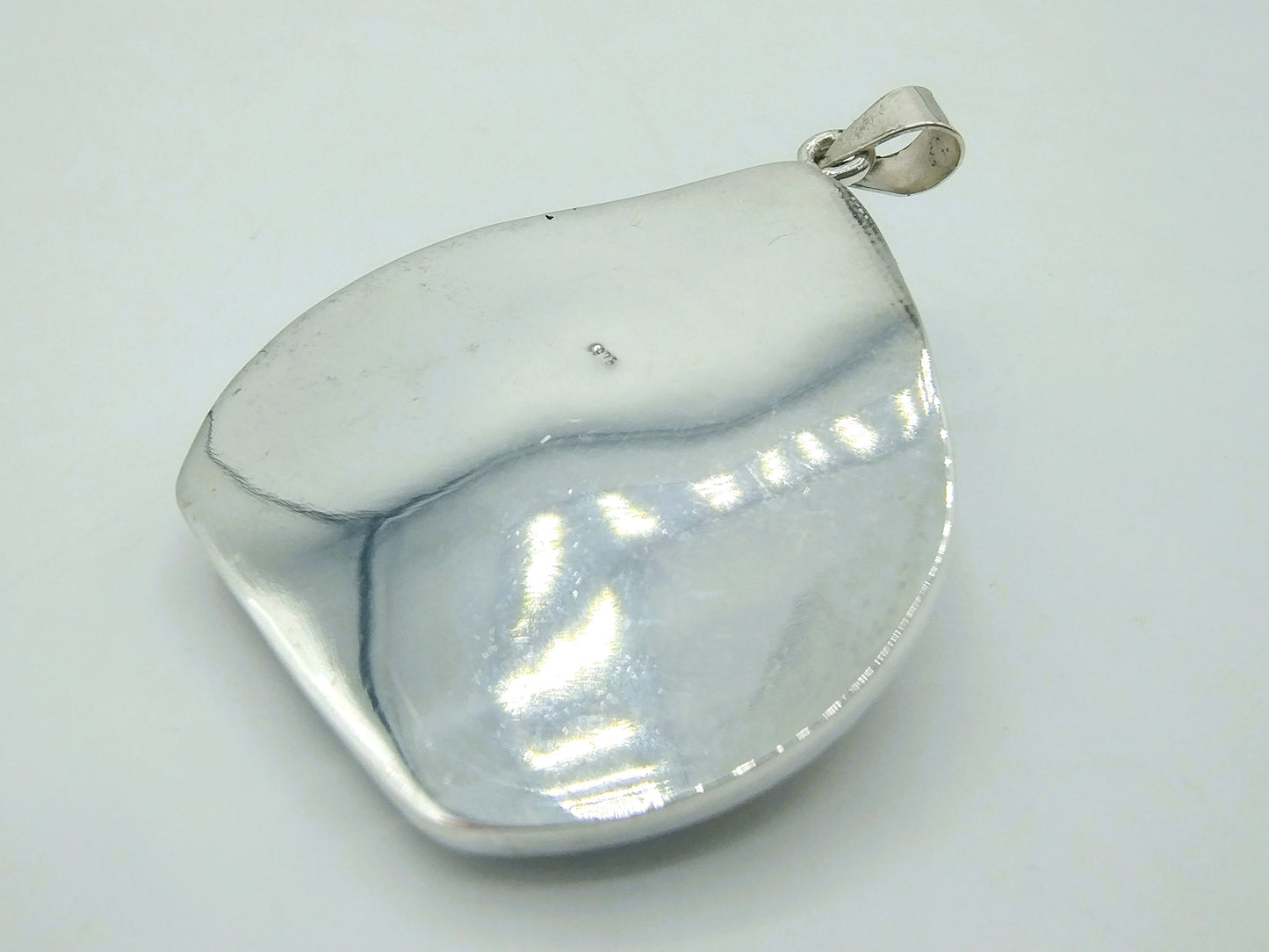 Zilveren hanger, schelp