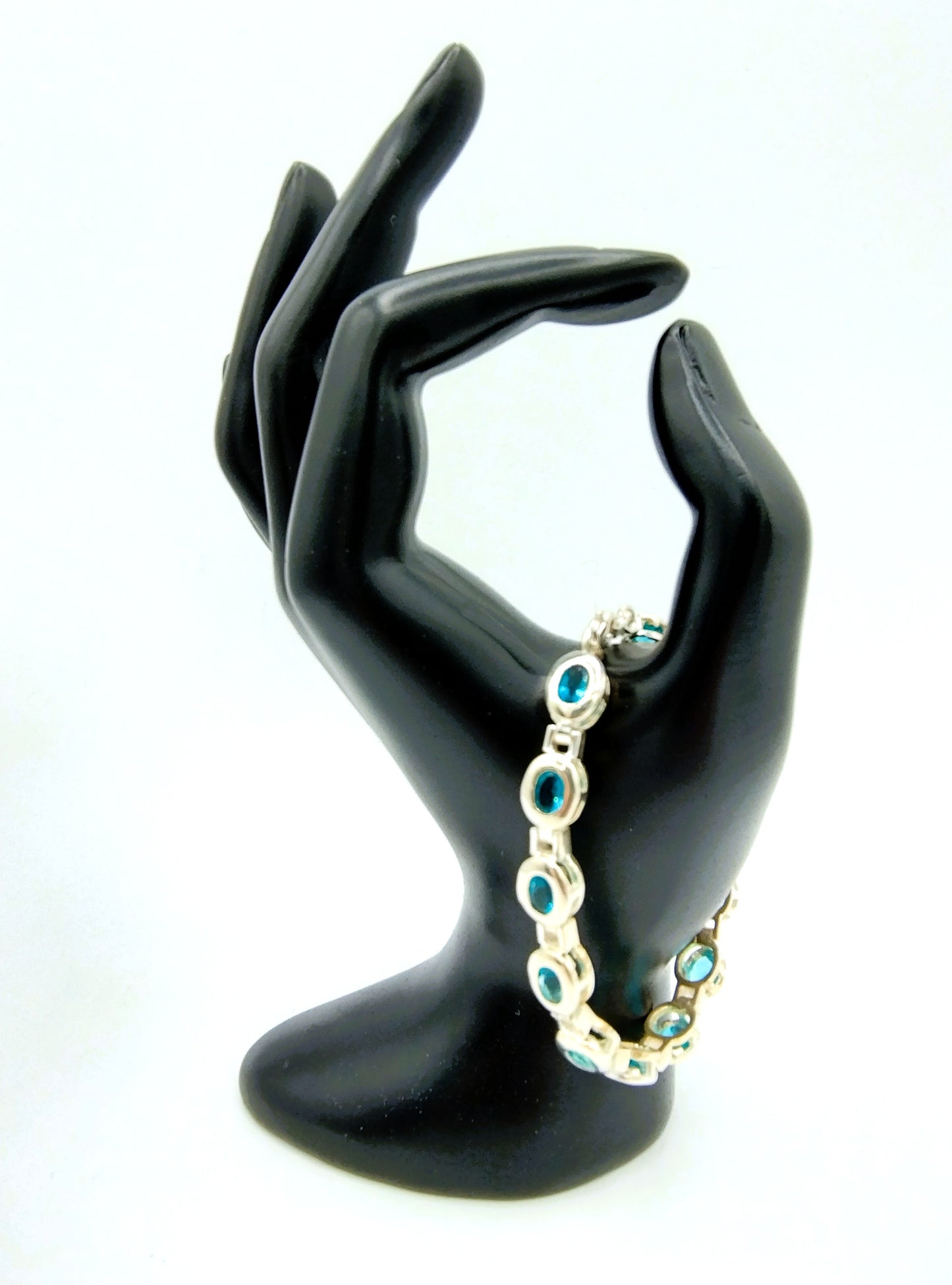 Zilveren armband met gefacetteerde blauwe topaas, 925
