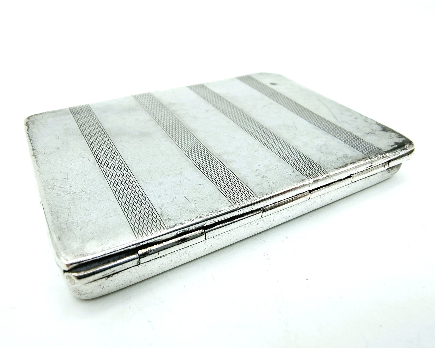 Silver cigarette box, including 2 cigarettes, 20th century