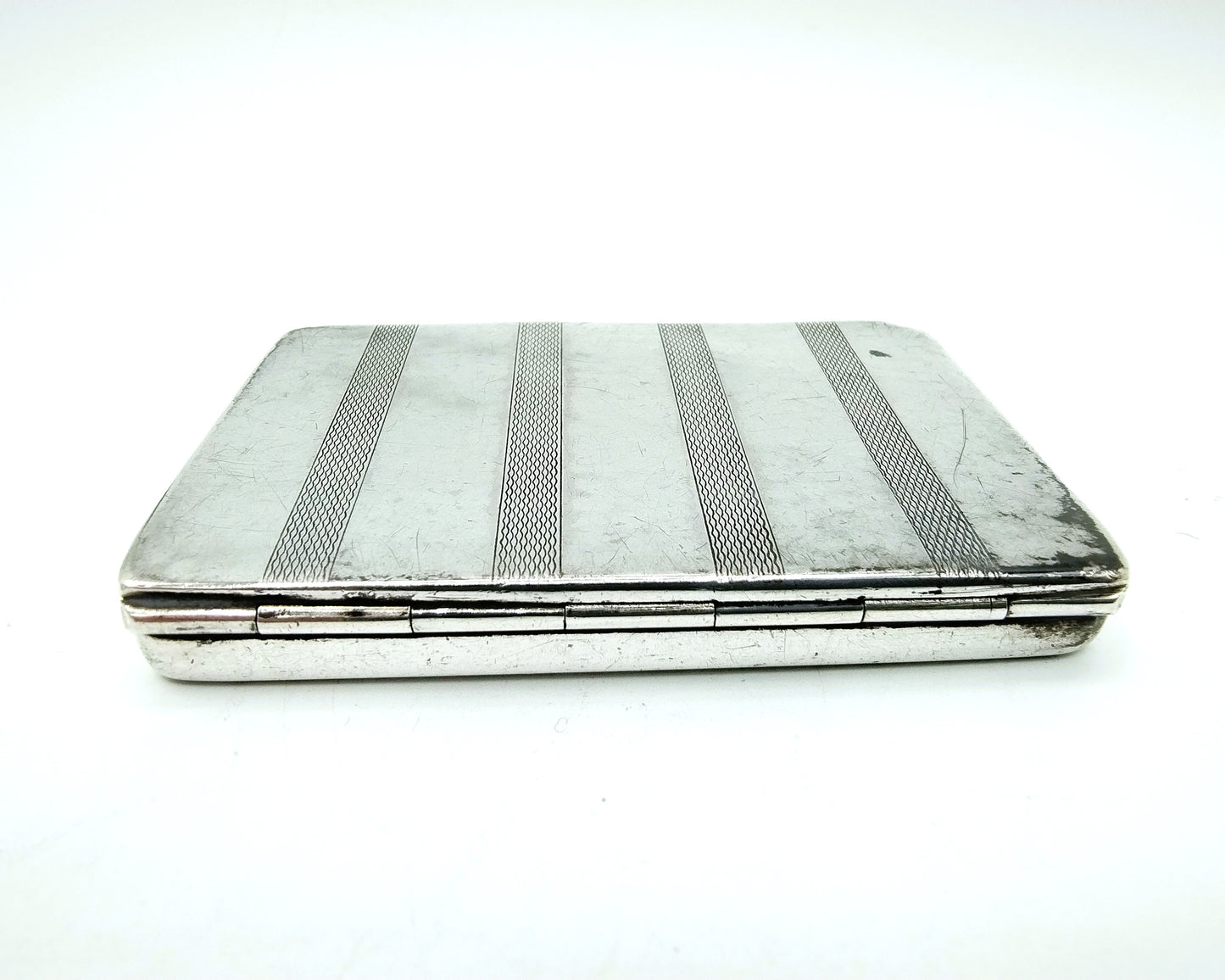 Silver cigarette box, including 2 cigarettes, 20th century