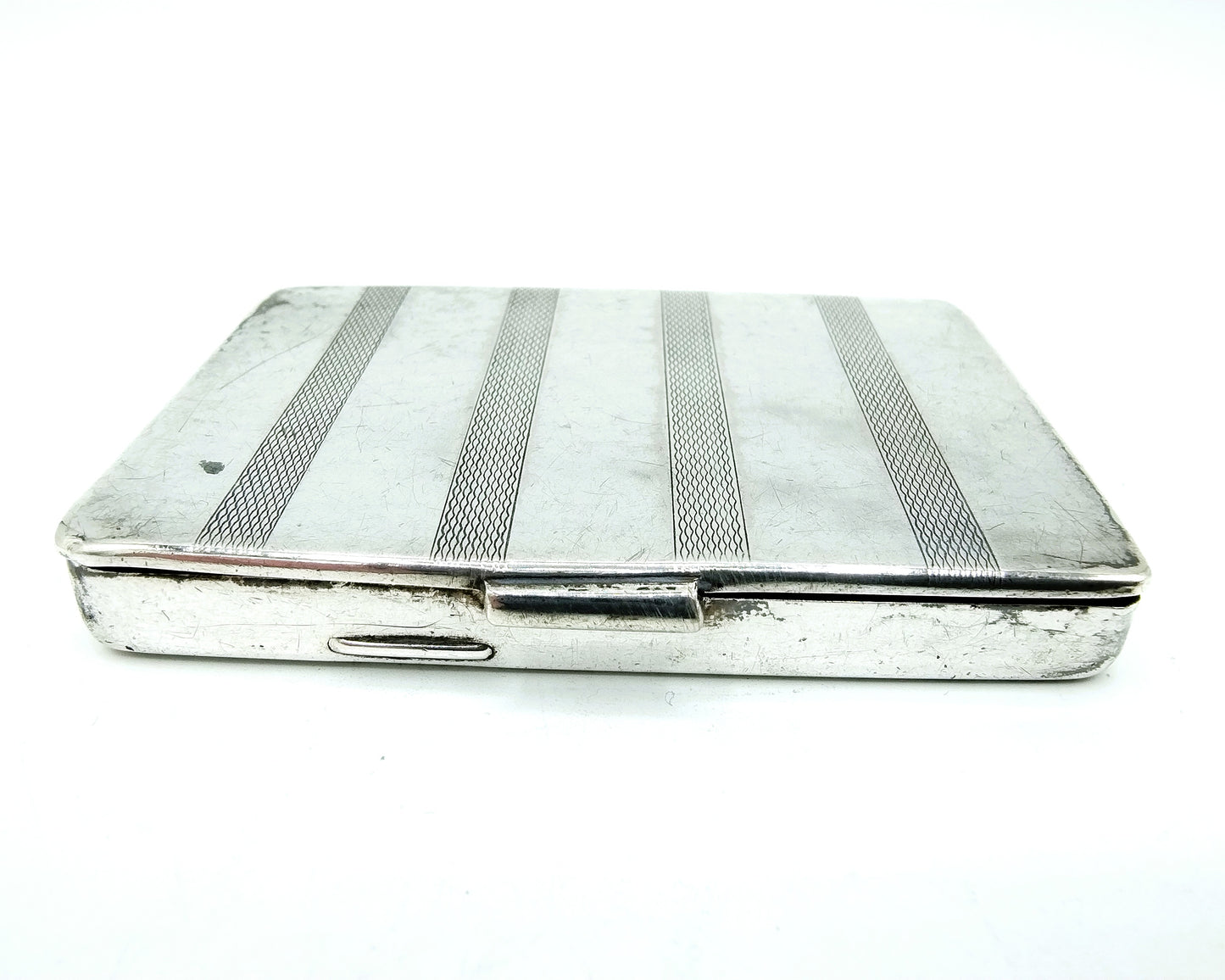 Silver cigarette box, including 2 cigarettes, 20th century
