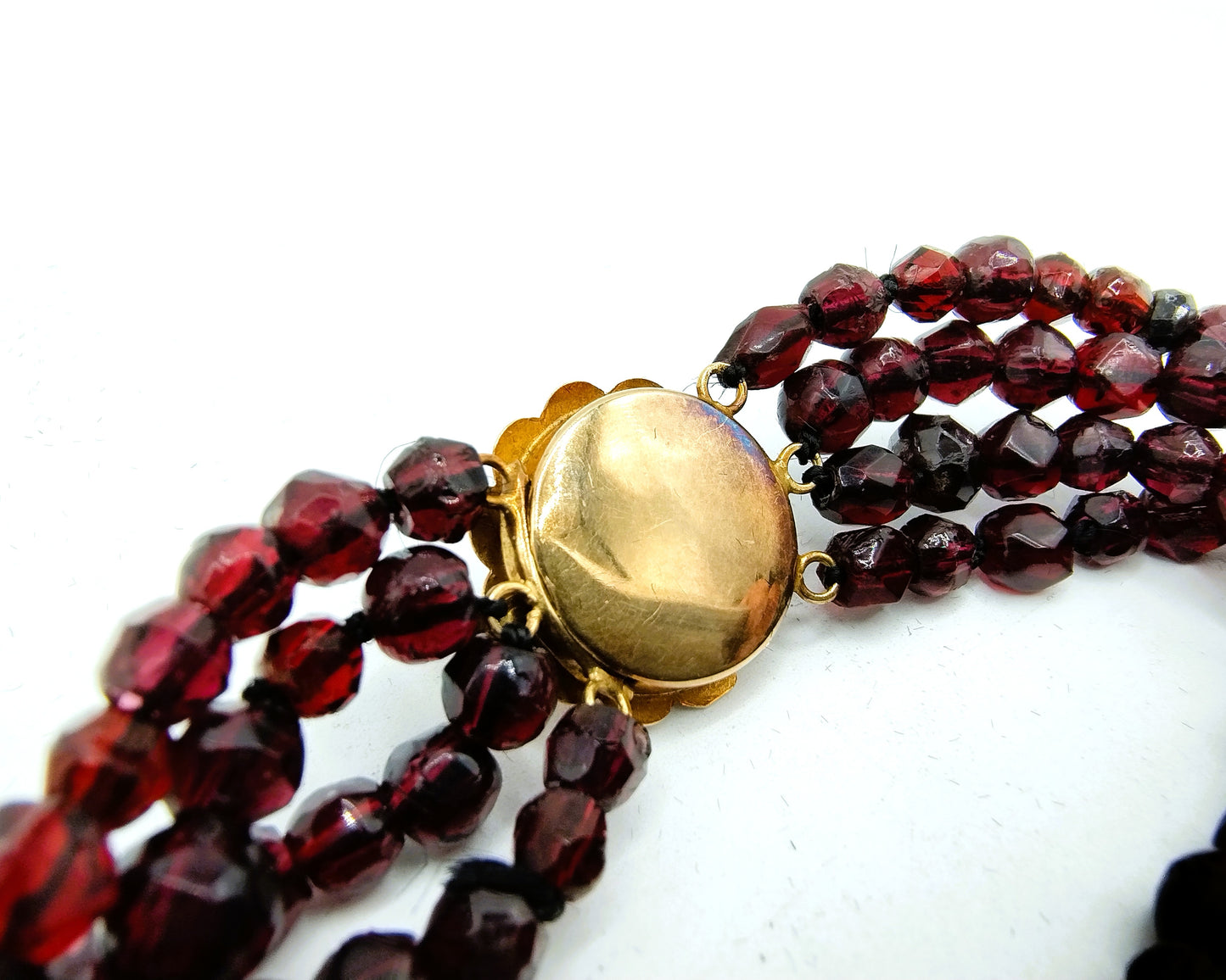 (Glass) garnet bracelet with gold clasp, 20th century