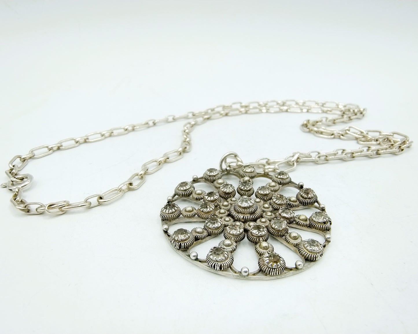 Zeeland silver button pendant inlaid with stones, on a chain