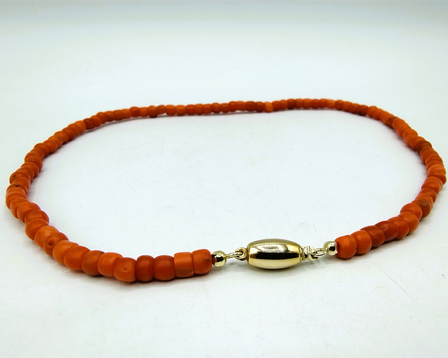 Red coral necklace with gold clasp