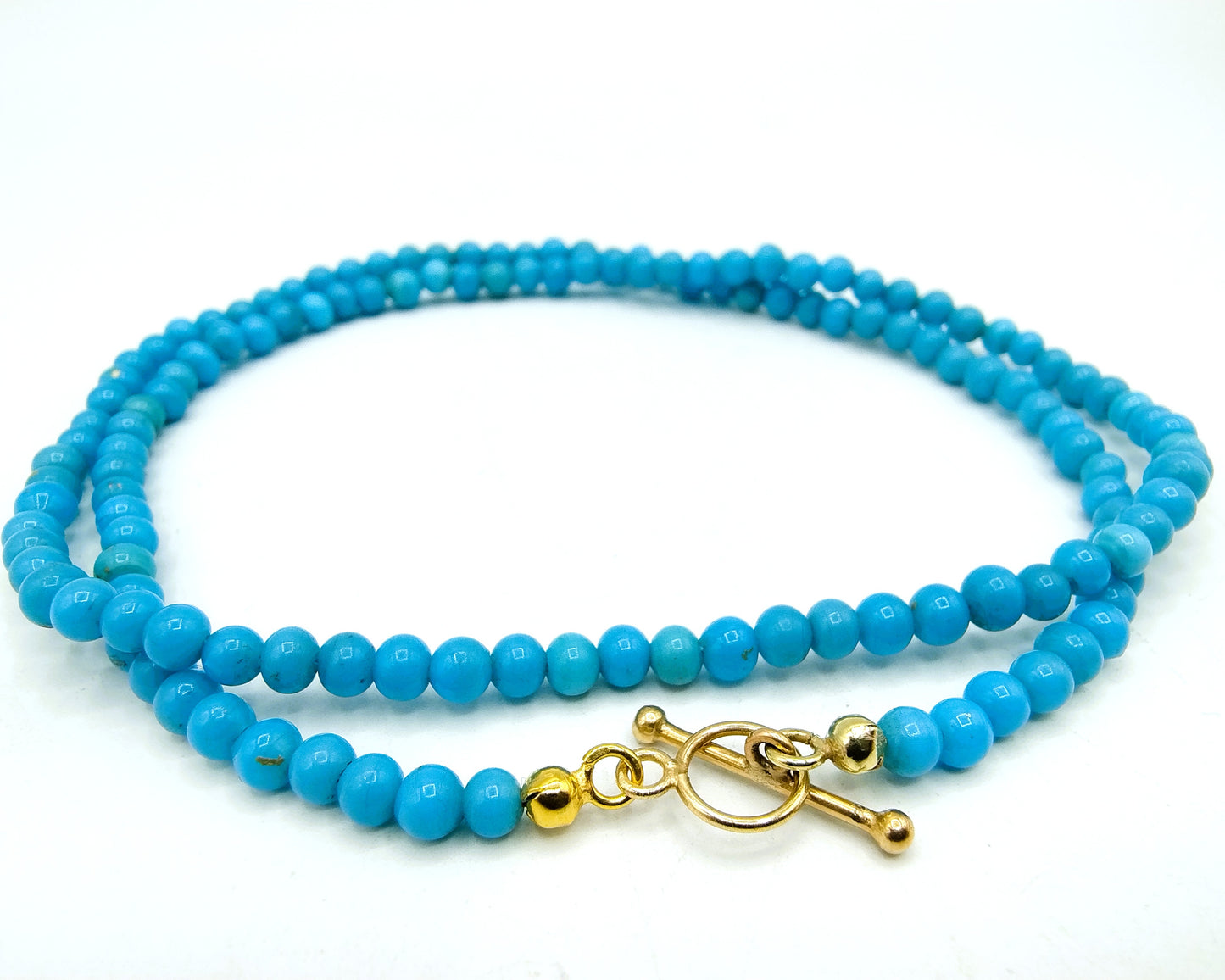 Turquoise necklace with gold toggle clasp, 585