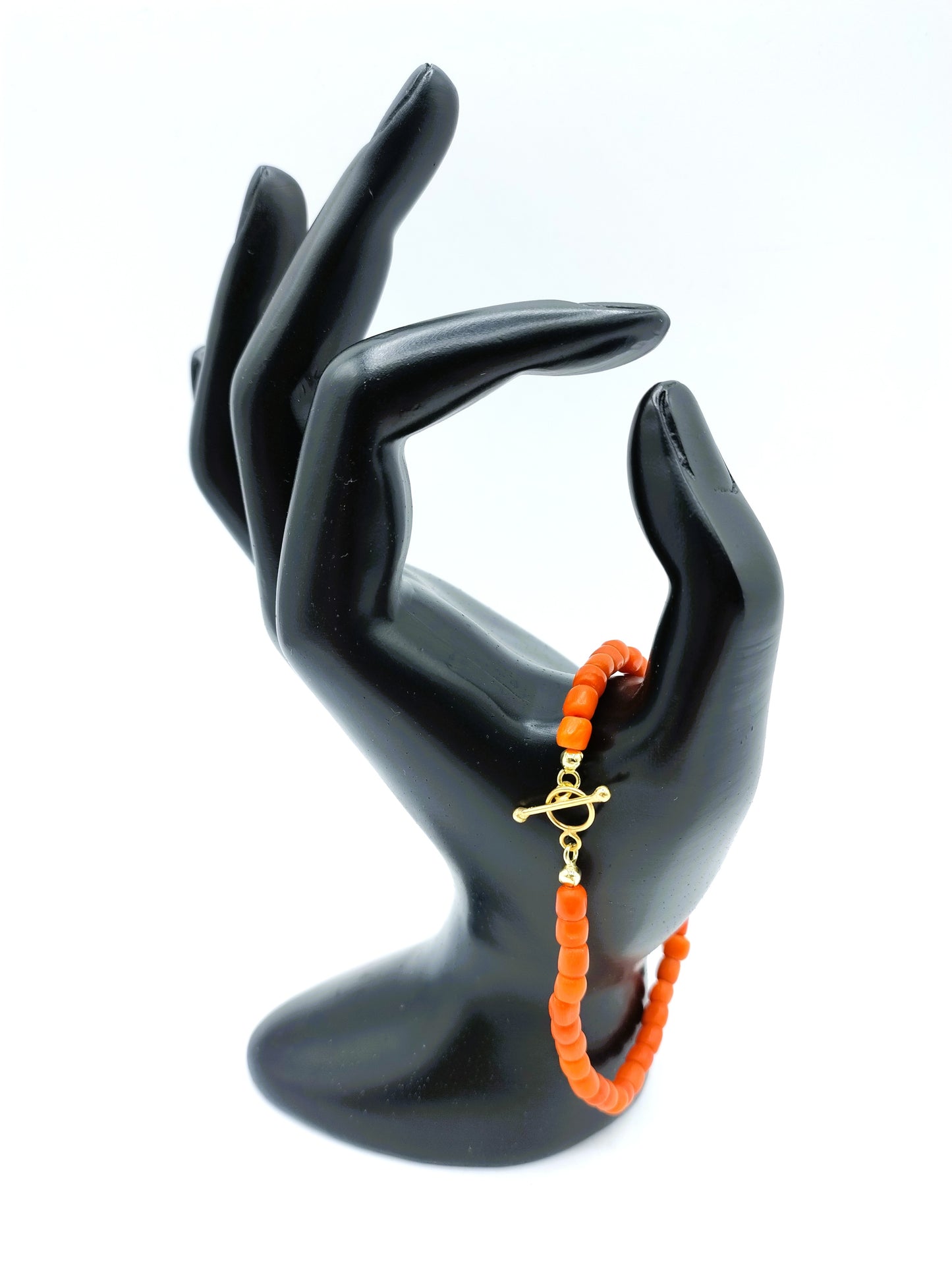 Bloedkoralen armband met gouden kapitelslot