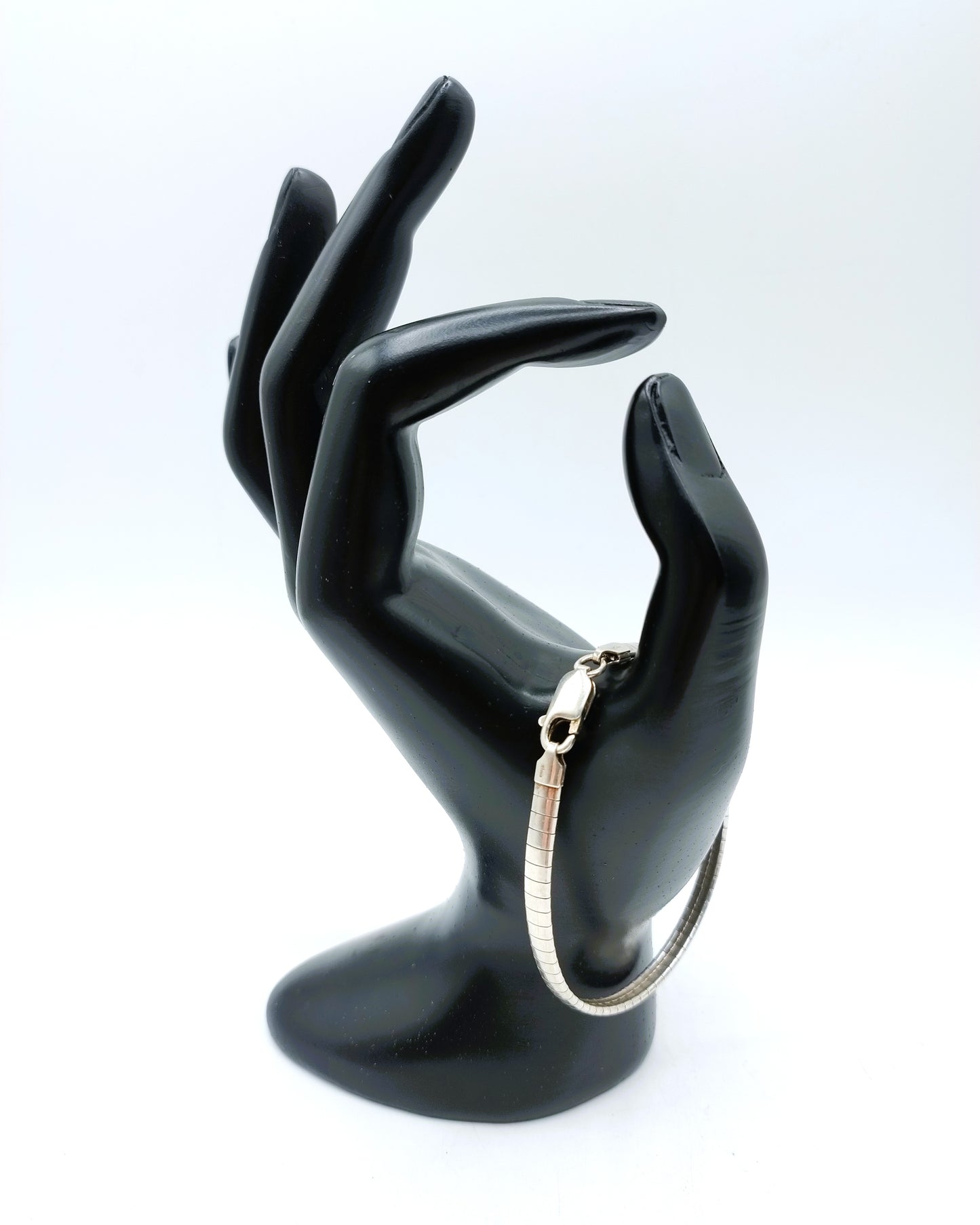 Silver omega necklace (42 cm) + bracelet, (19 cm).