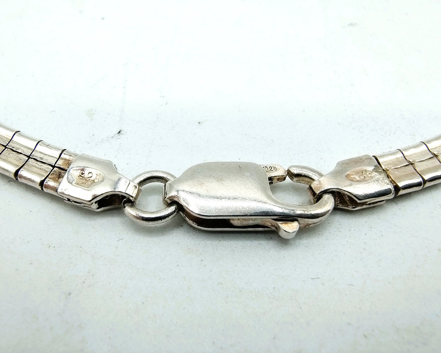 Silver omega necklace (42 cm) + bracelet, (19 cm).