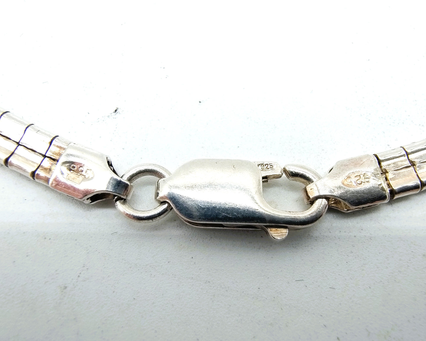 Silver omega necklace (42 cm) + bracelet, (19 cm).
