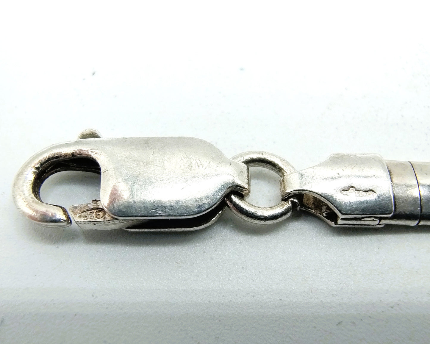 Silver omega necklace (42 cm) + bracelet, (19 cm).