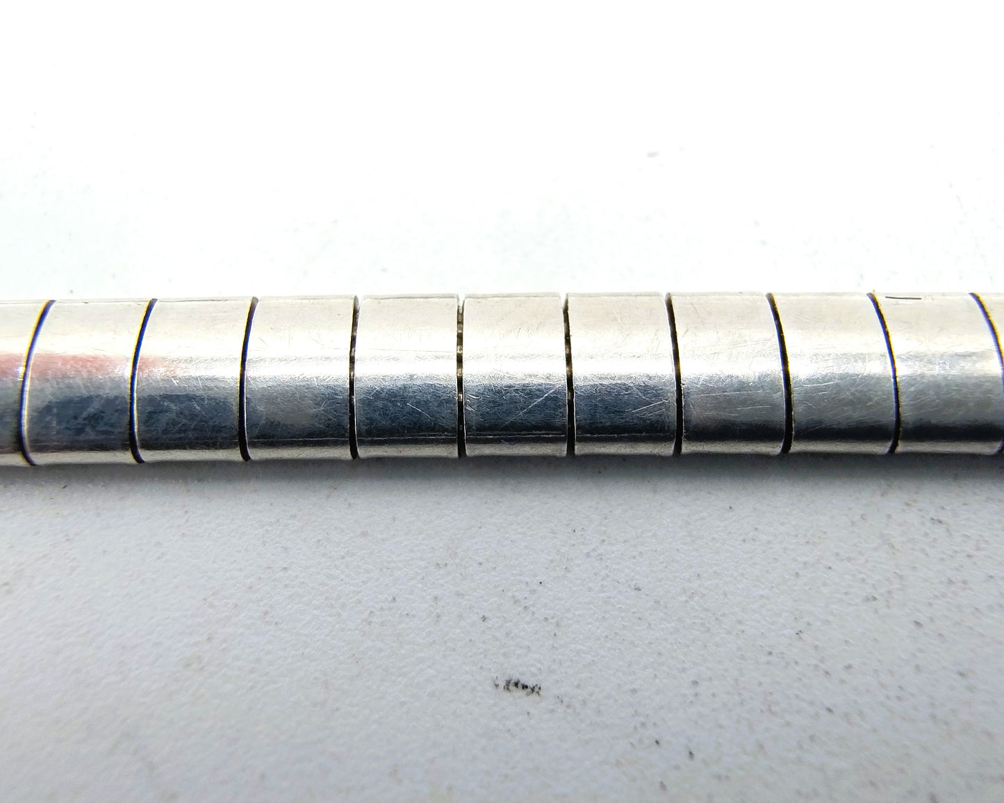Silver omega necklace (42 cm) + bracelet, (19 cm).