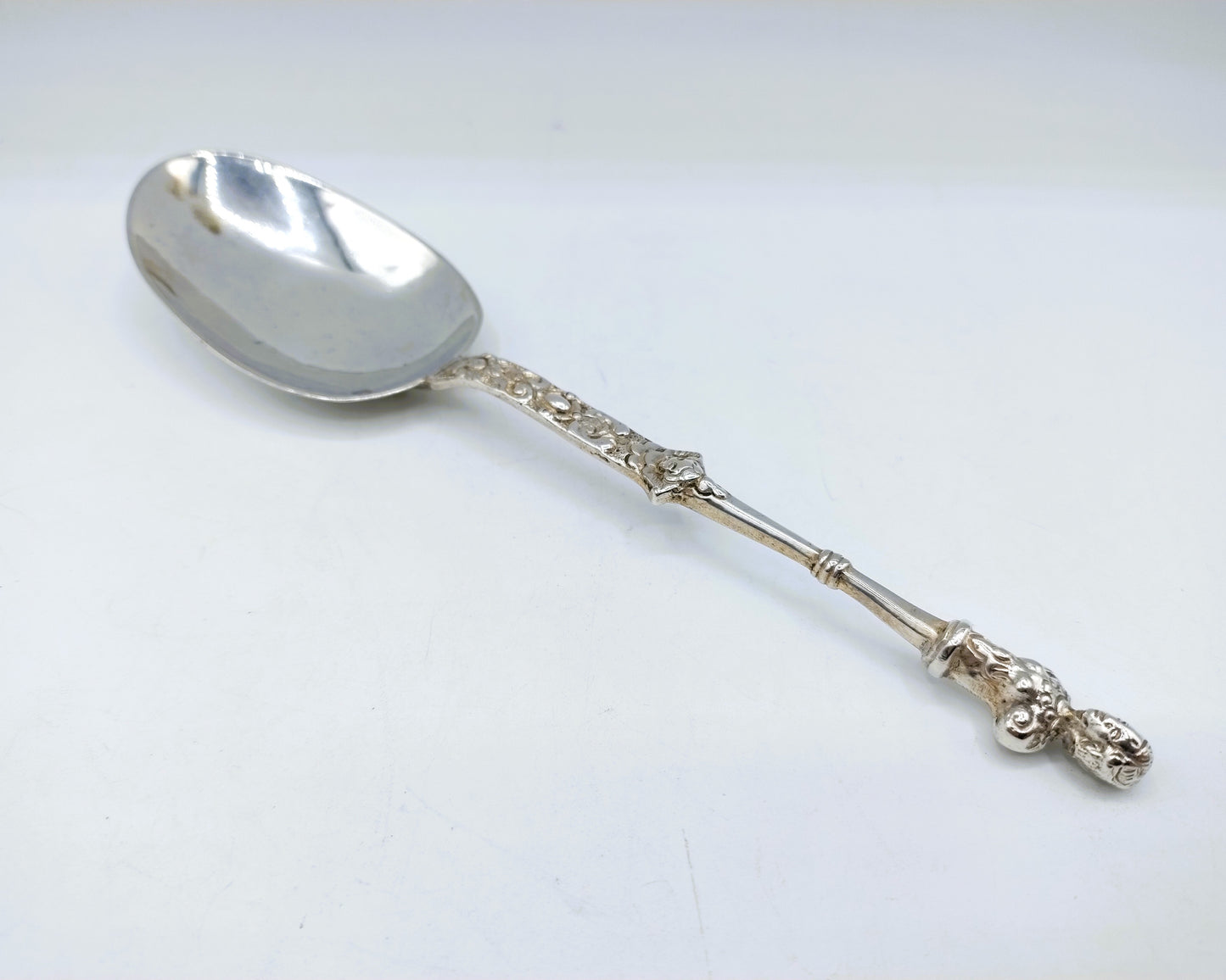 Silver occasional spoon, pseudomarks, 1883