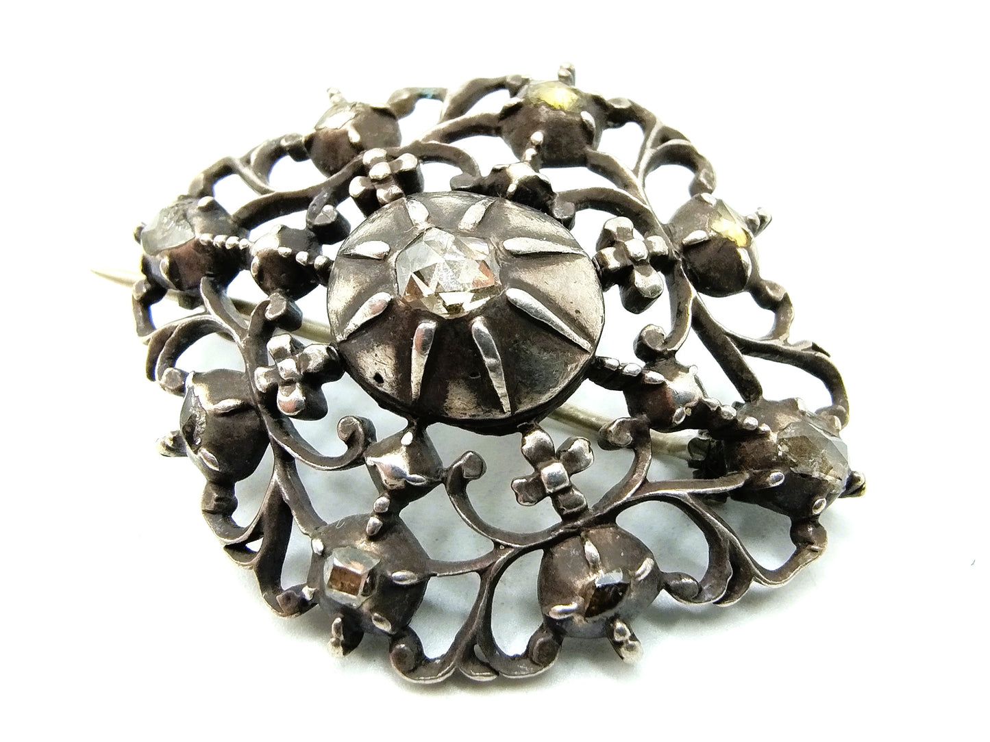 Antique silver brooch with 9 rose diamonds