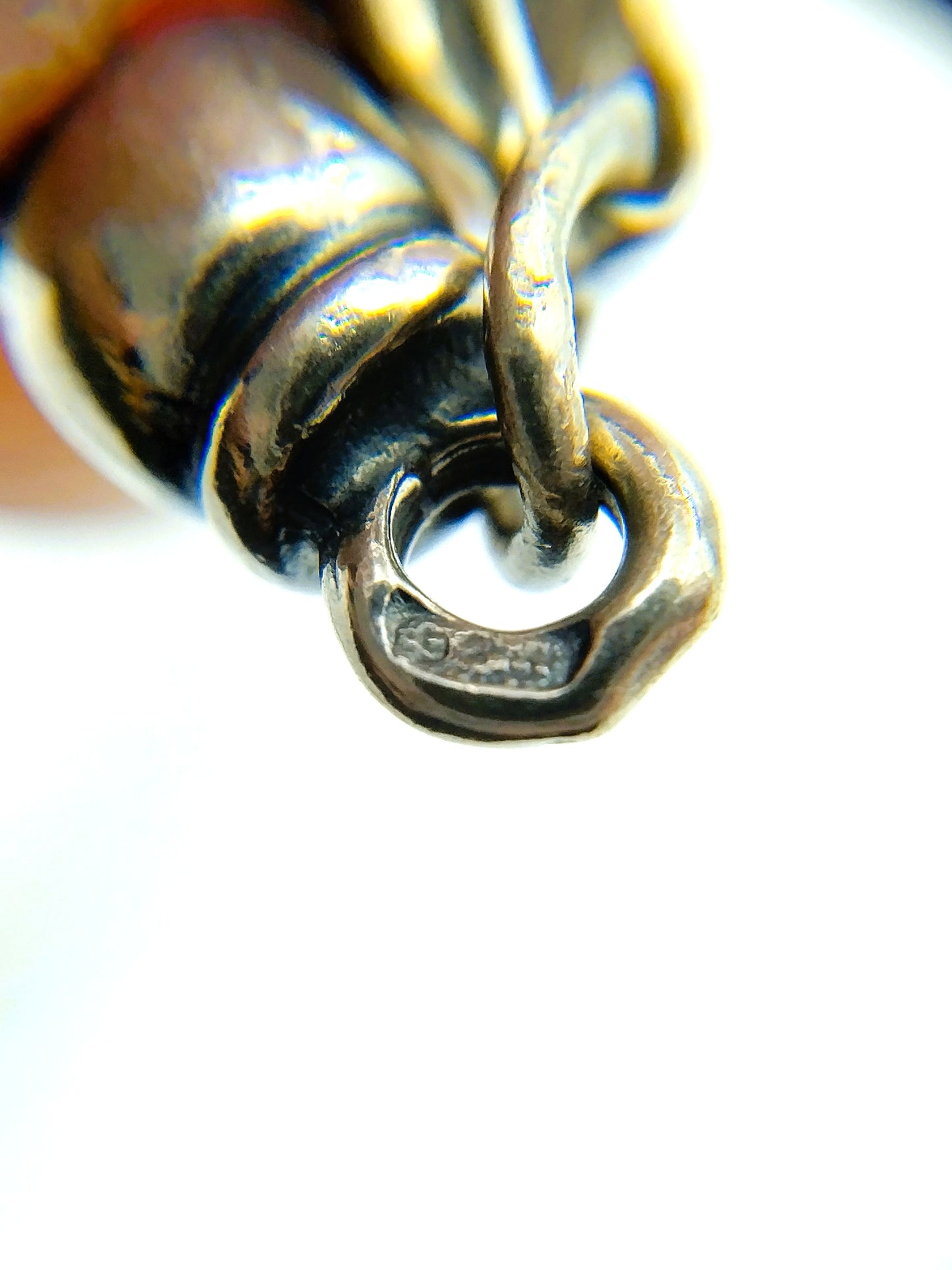 Silver chain + bracelet, snake motif.