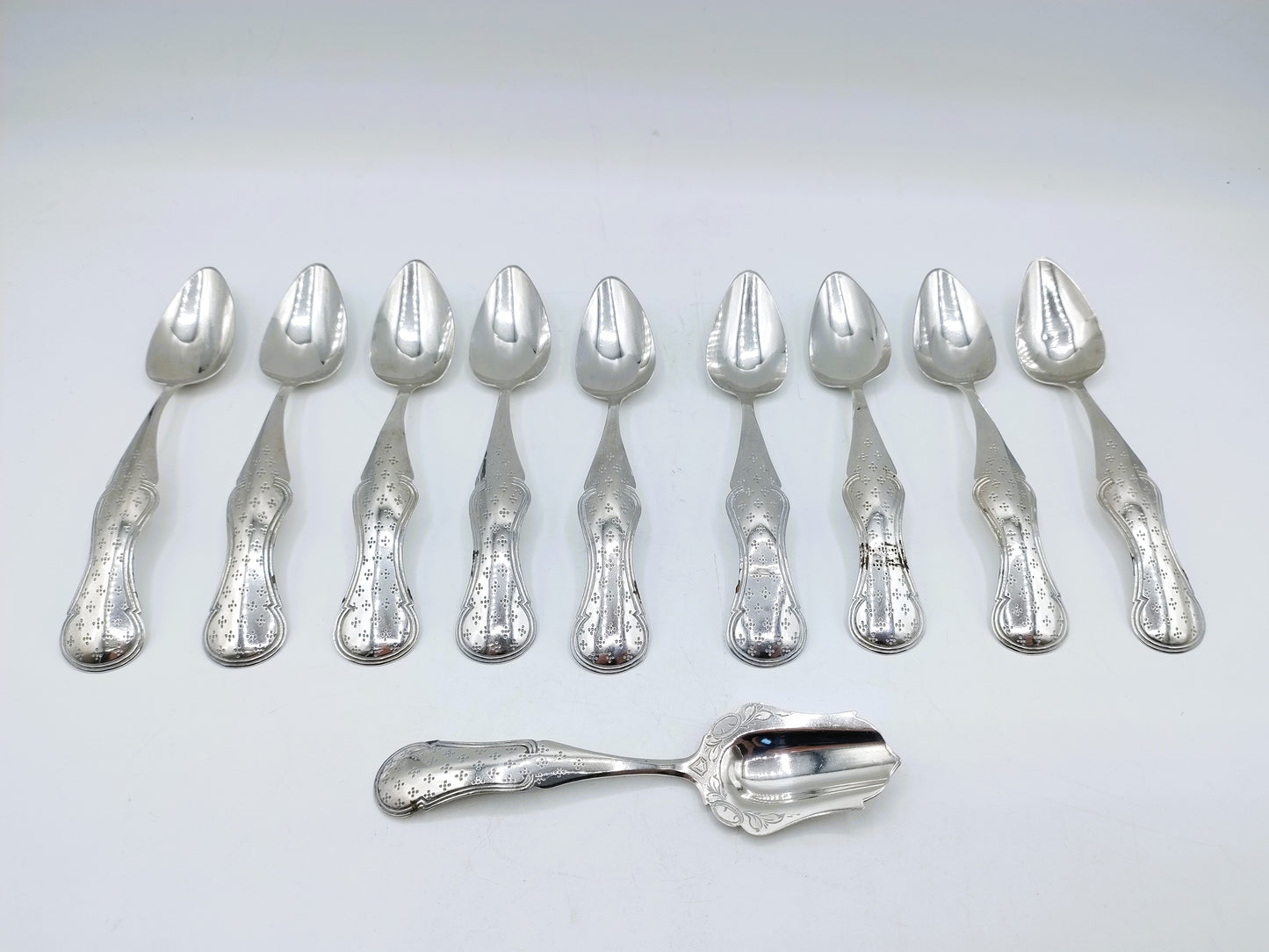 Set aus 9 silbernen Teelöffeln und einem Zuckerlöffel, A. Kuylenburg, Schoonhoven, 1875