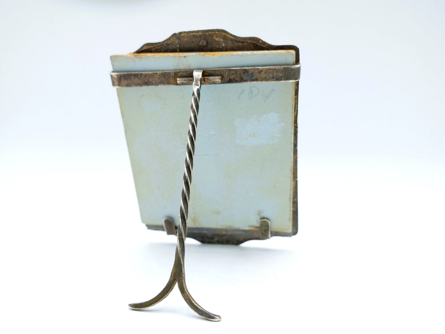 Silver photo frame of bag bracket with Keeshond, 18th century