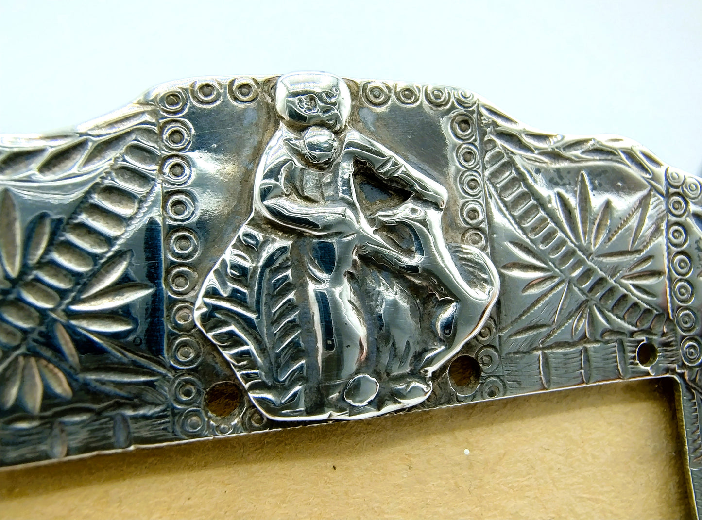 Silver photo frame of bag bracket with Keeshond, 18th century