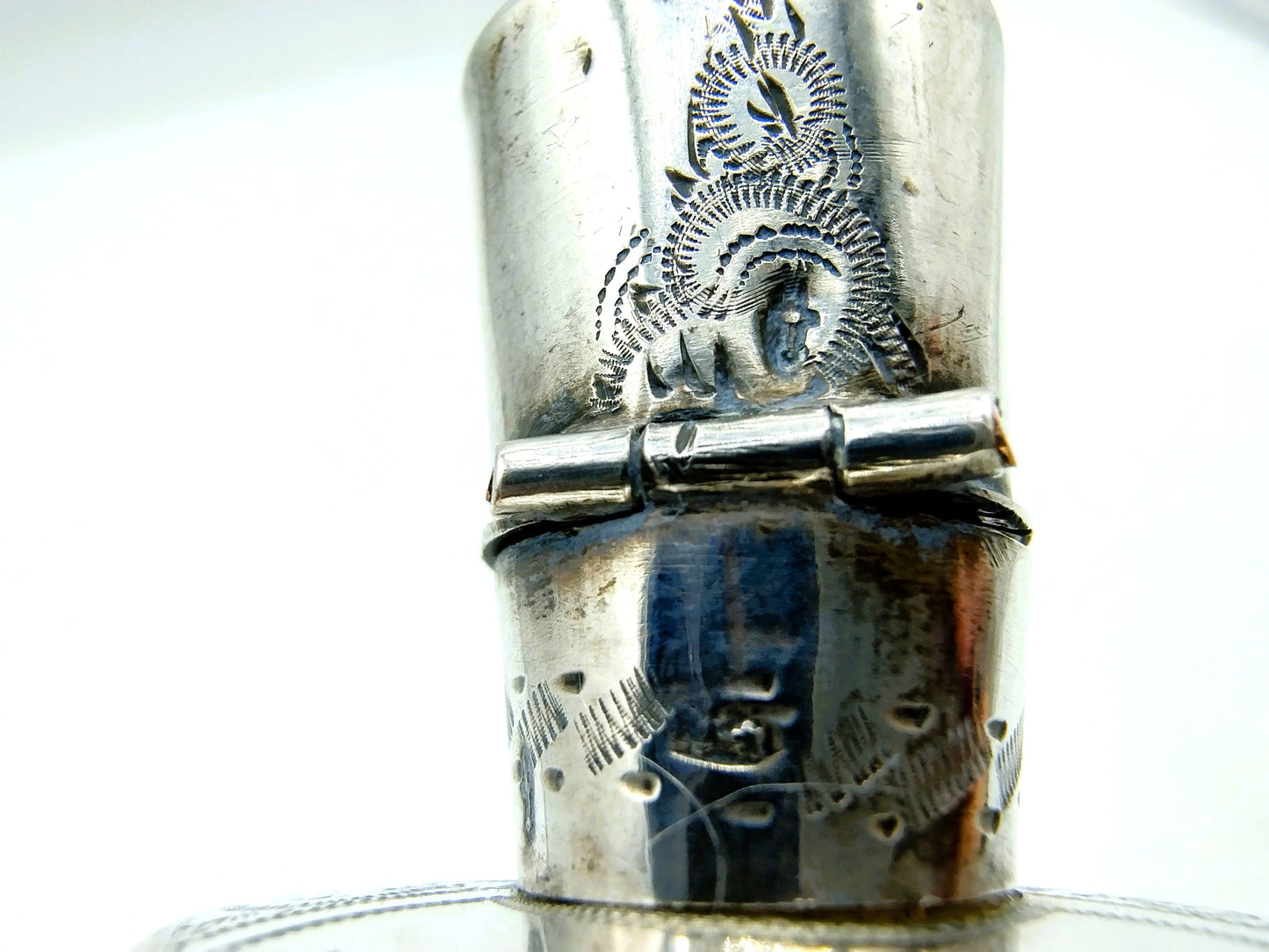 Crystal perfume bottle with silver cap. 19th century.