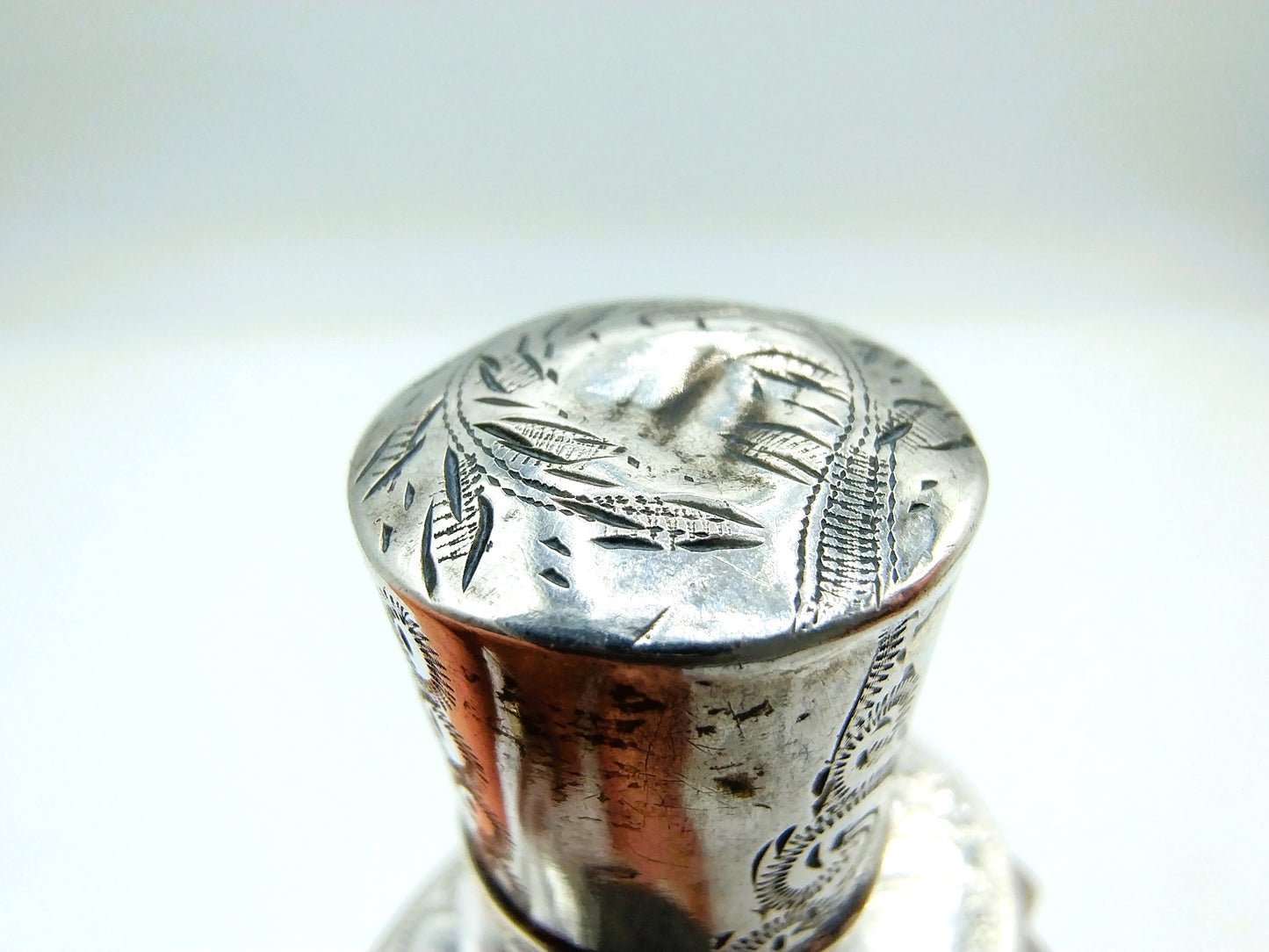 Crystal perfume bottle with silver cap. 19th century.