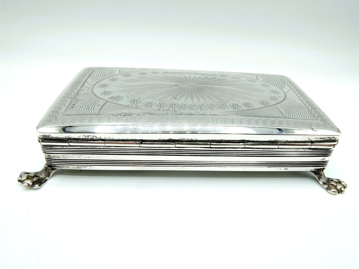 Silver jewelry box made from a tobacco box, 1839