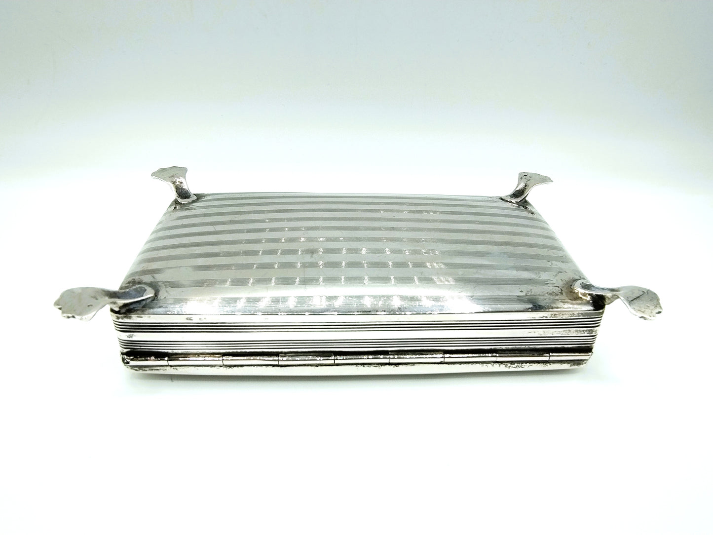 Silver jewelry box made from a tobacco box, 1839