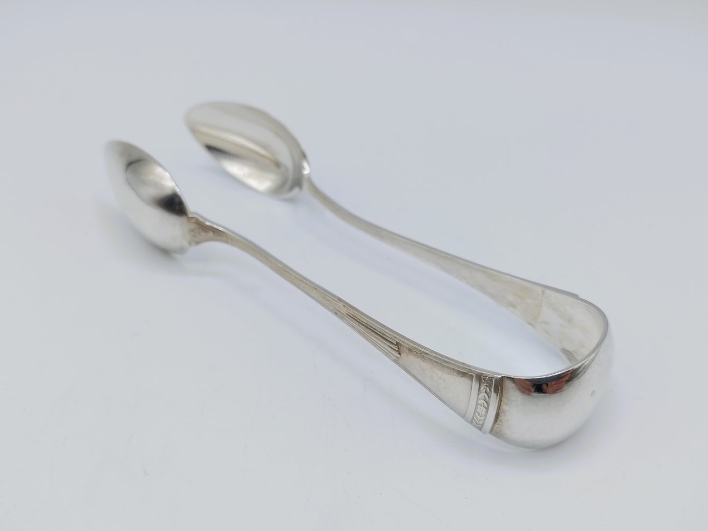 Silver sugar cube tongs, from Kempen & Zn, Voorschoten, 1920
