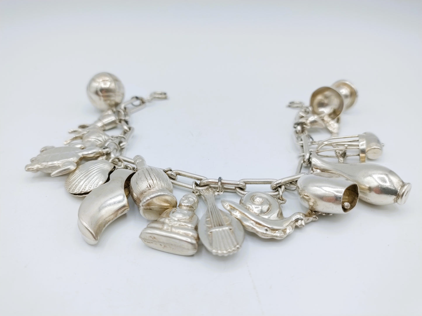 Silbernes Bettelarmband mit 16 (!) Charms, 22 cm