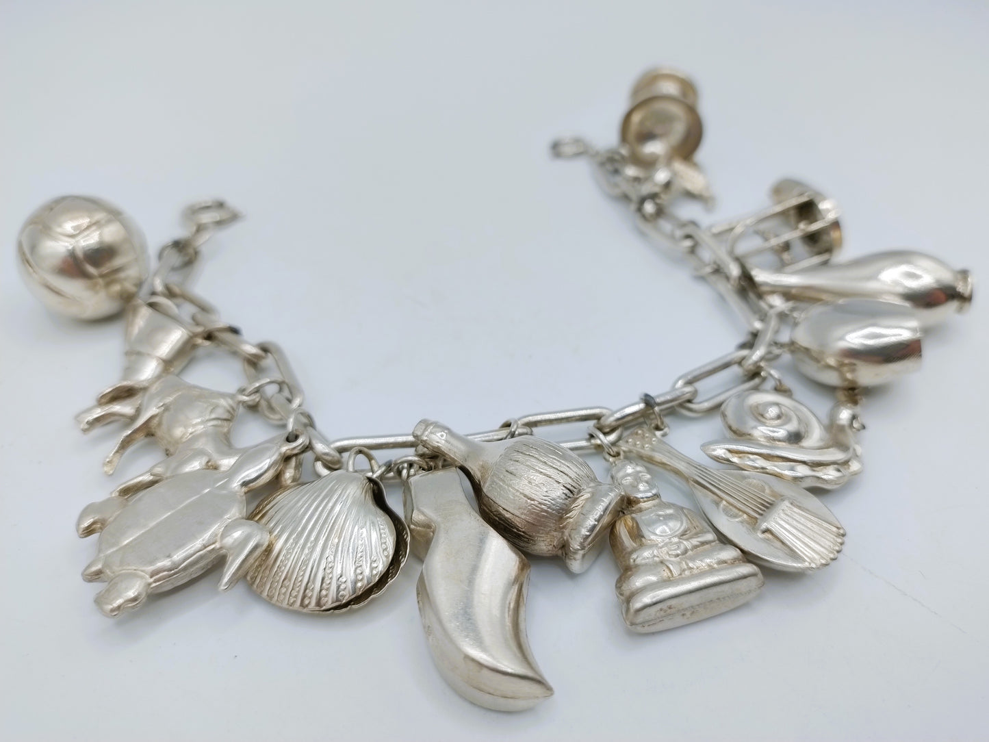 Silbernes Bettelarmband mit 16 (!) Charms, 22 cm