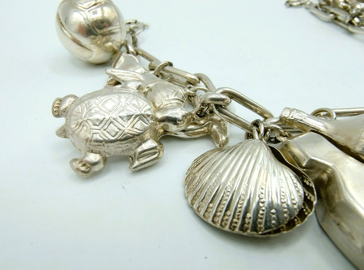 Silbernes Bettelarmband mit 16 (!) Charms, 22 cm