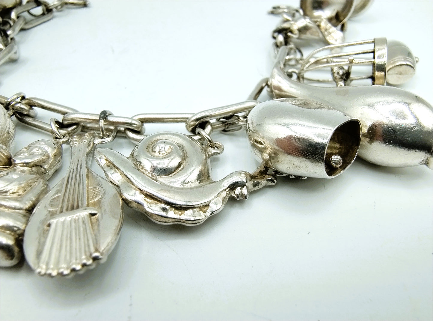 Silbernes Bettelarmband mit 16 (!) Charms, 22 cm