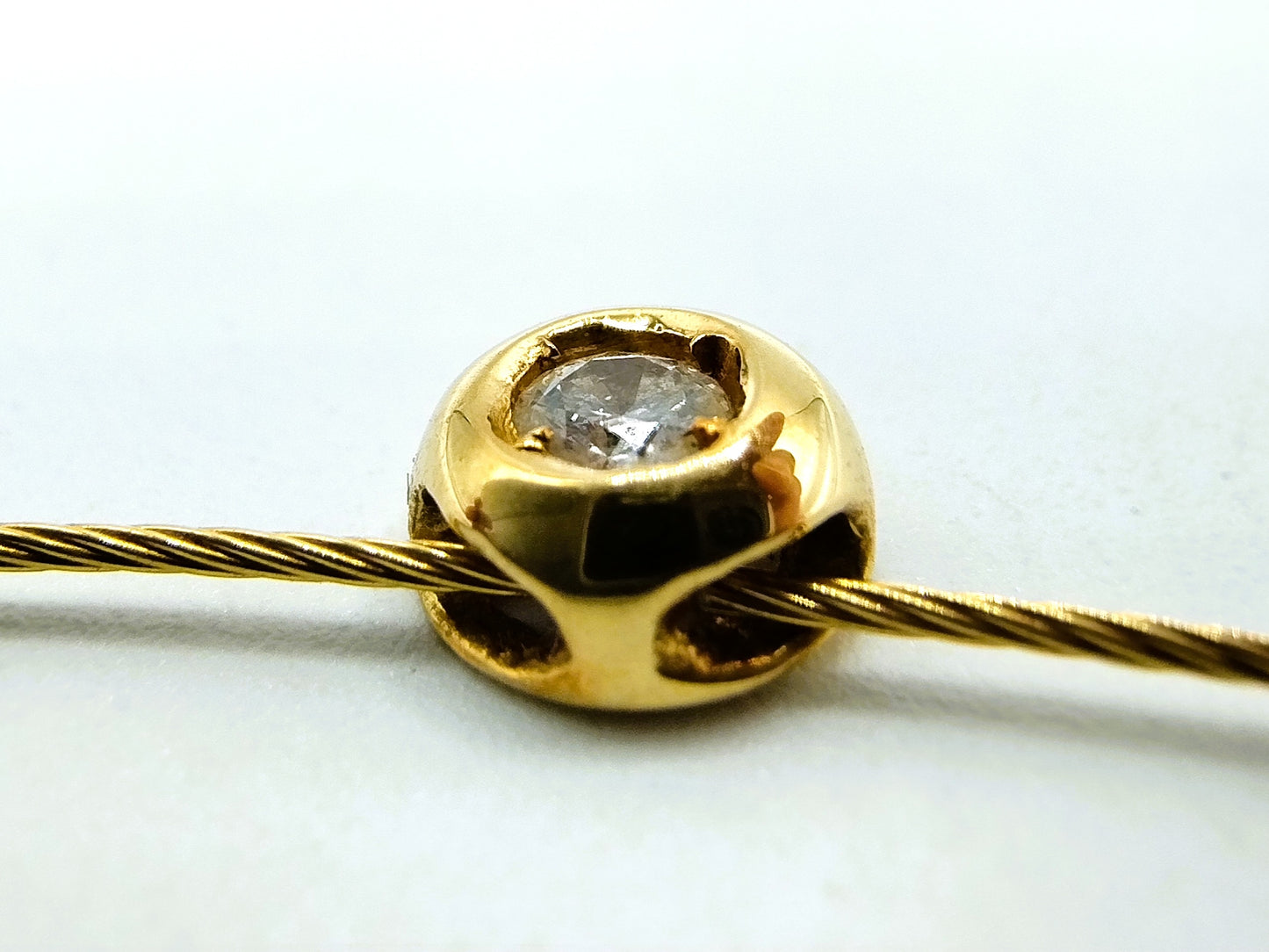 18 carat gold ladies choker with a 0.10 ct diamond.