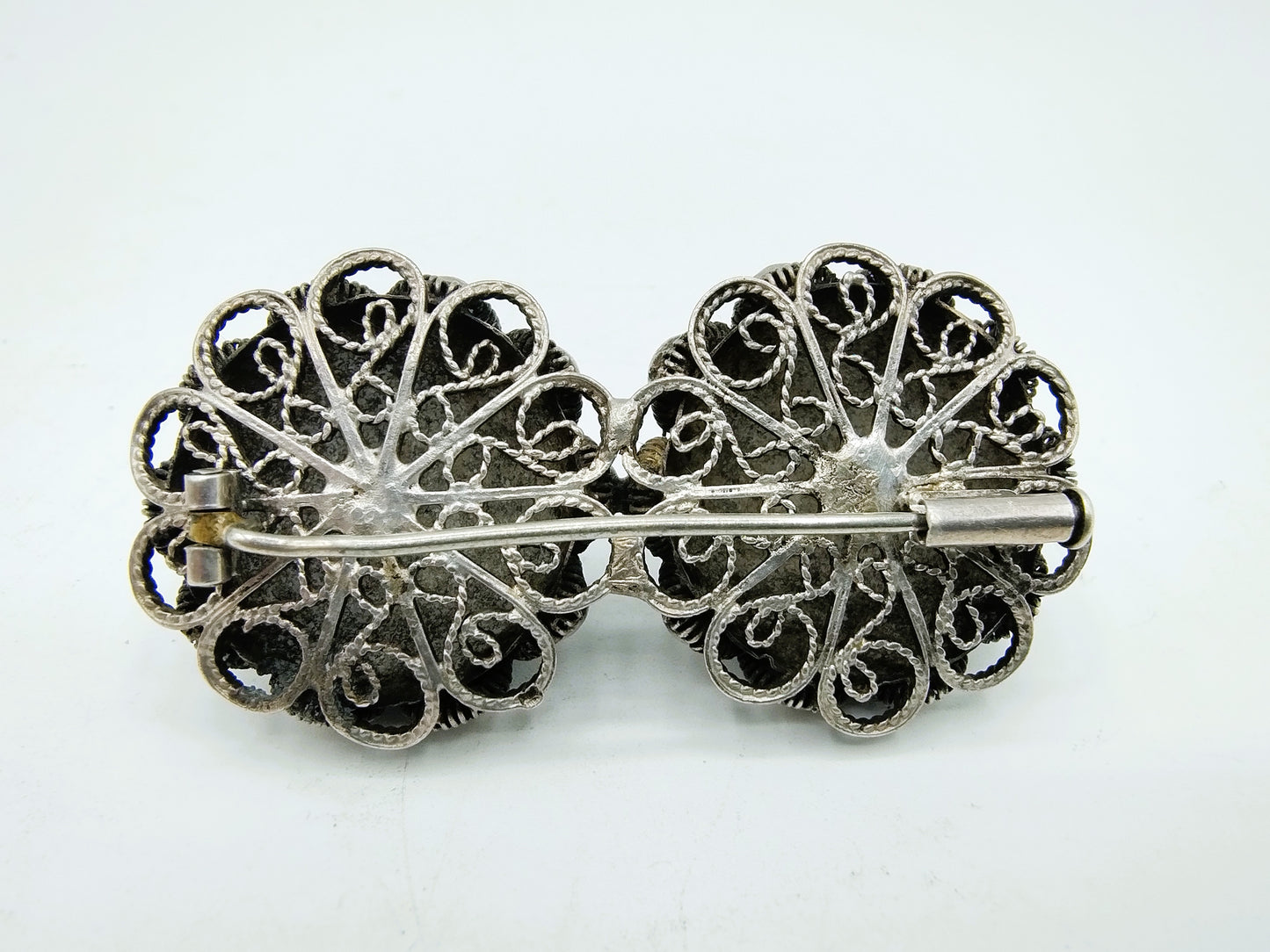 Silver brooch made of throat buttons, 19th century