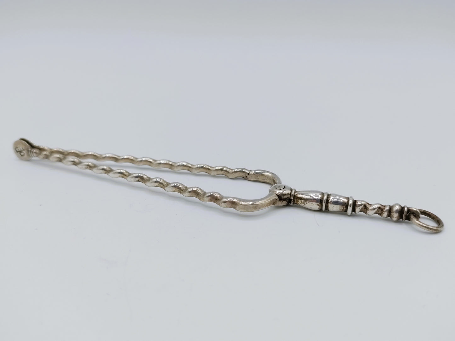 Zilveren miniatuur haardtang, A. van Geffen, Amsterdam, 1768