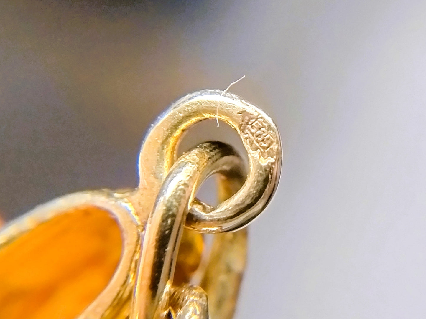 Goldanhänger mit Fußballschuhen, 14 Karat.