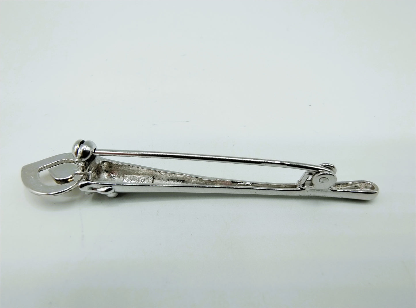 Silver brooch with candle, T. Klots, Pforzheim, Germany