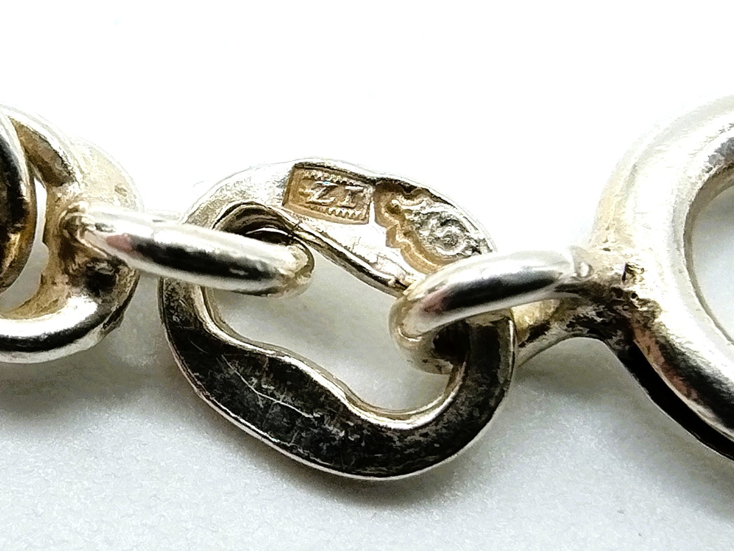 Gevlochten zilveren koord armband, 20 cm