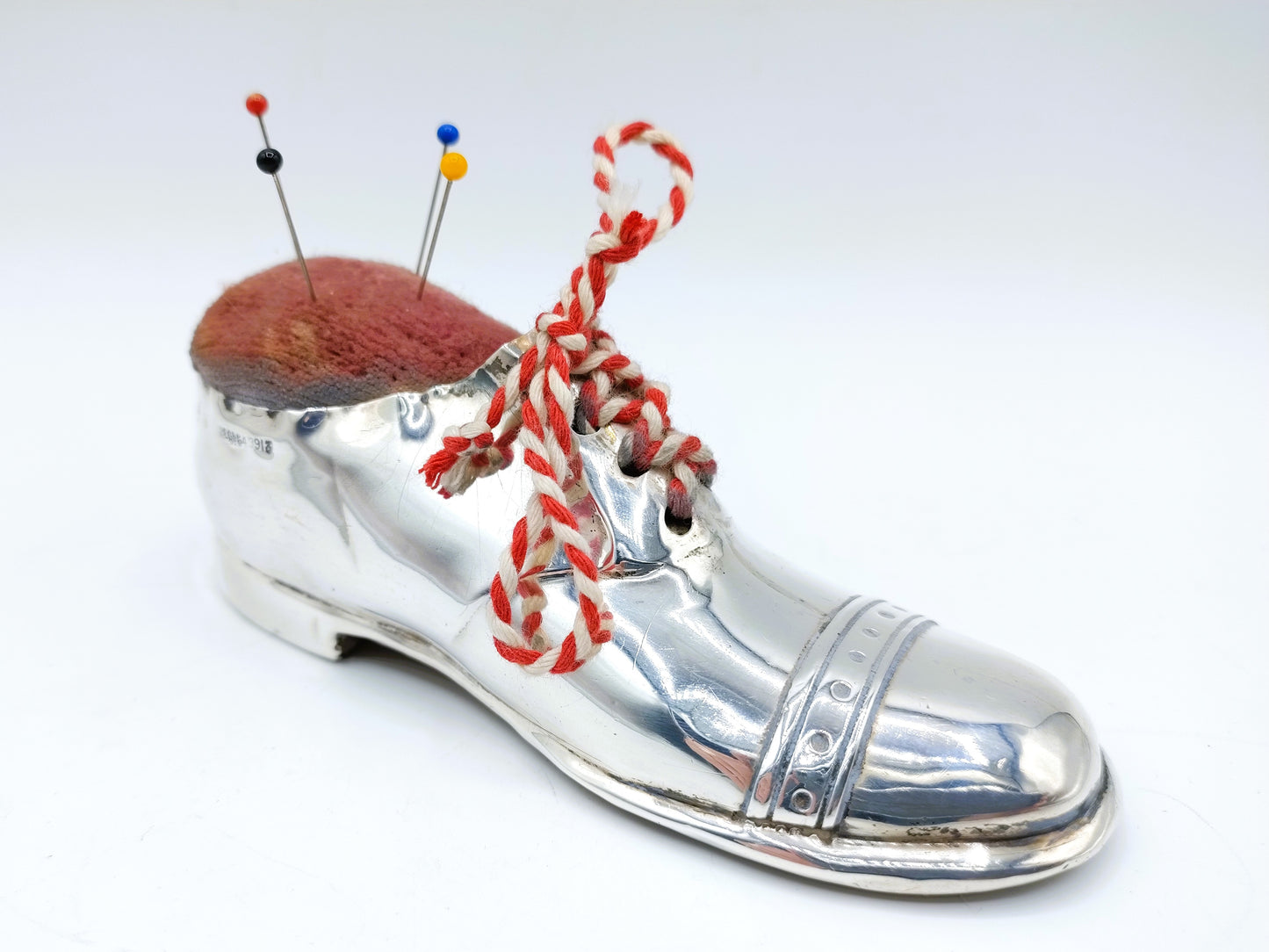 Silver shoe, pincushion, S. Blanckensee & Son, Birmingham, 1910