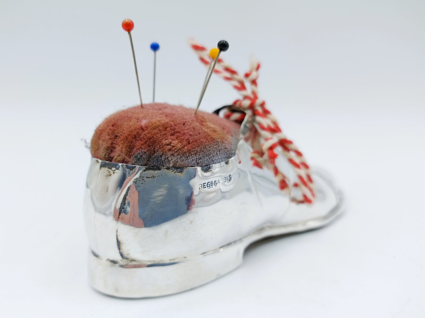 Silver shoe, pincushion, S. Blanckensee & Son, Birmingham, 1910