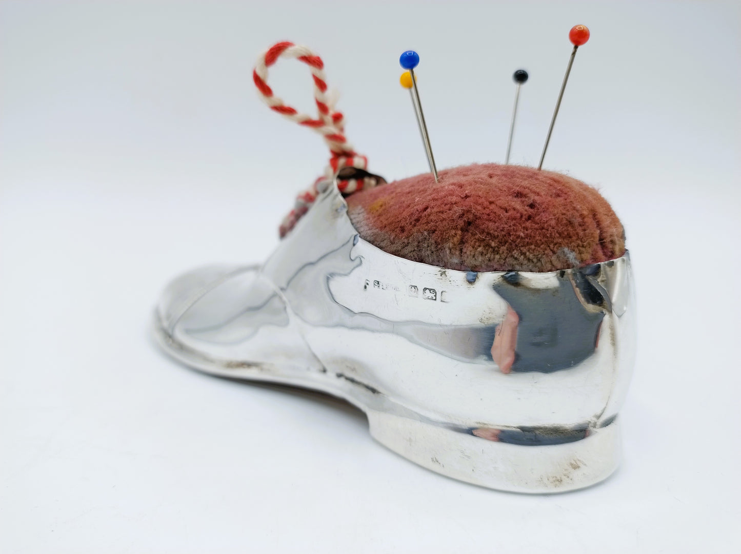 Silver shoe, pincushion, S. Blanckensee & Son, Birmingham, 1910
