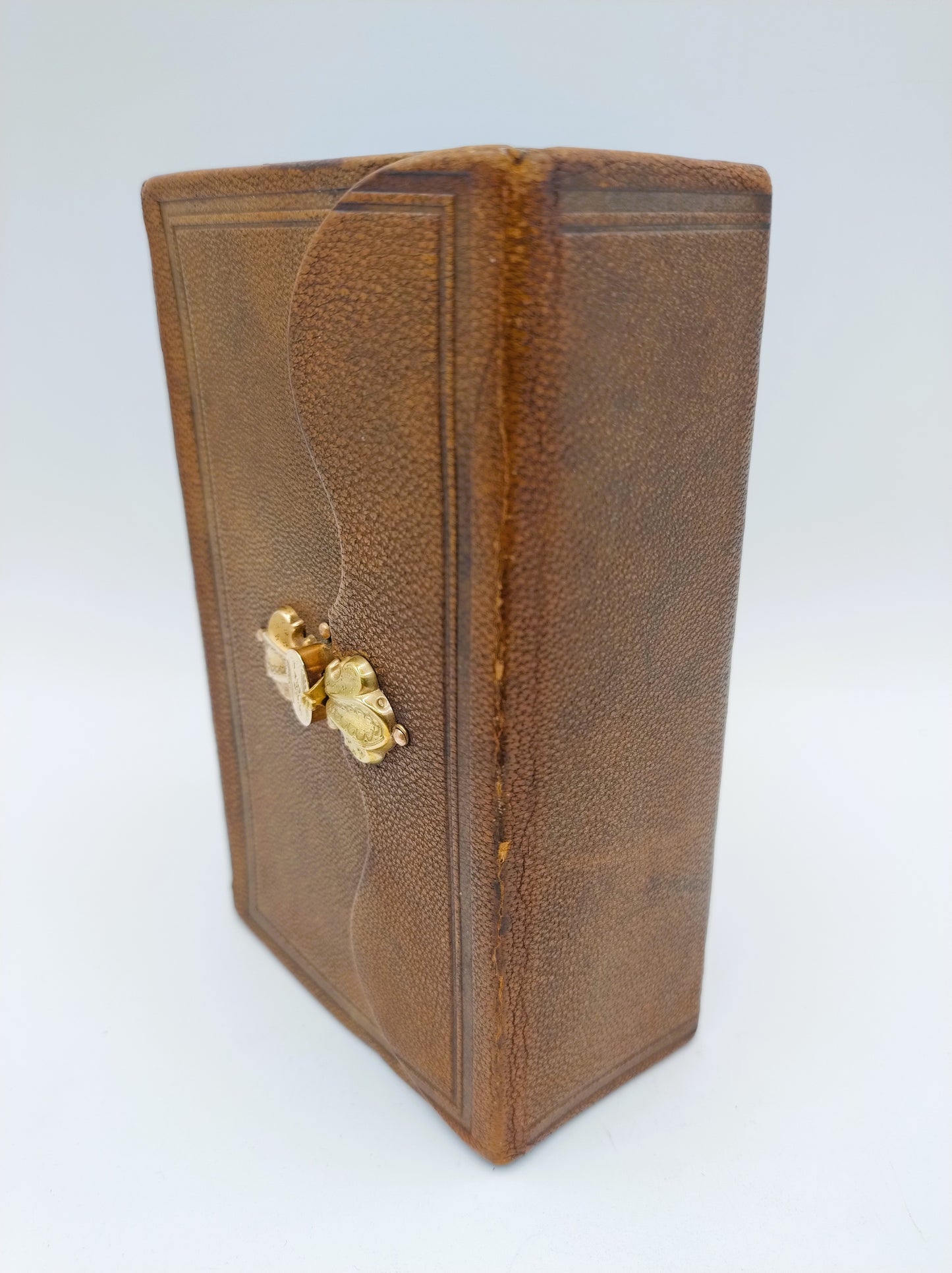Bible with gold clip lock, 1884