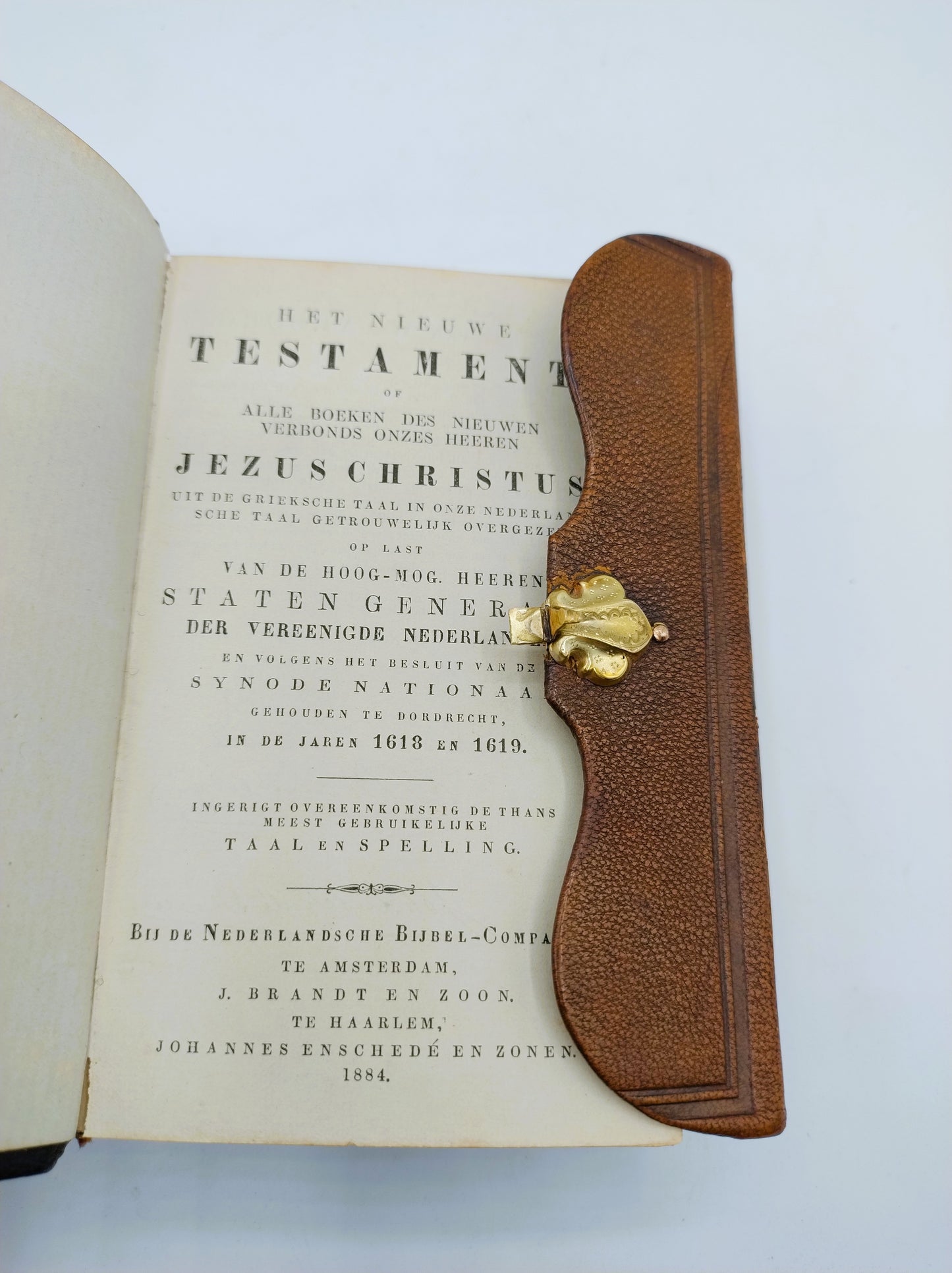 Bible with gold clip lock, 1884