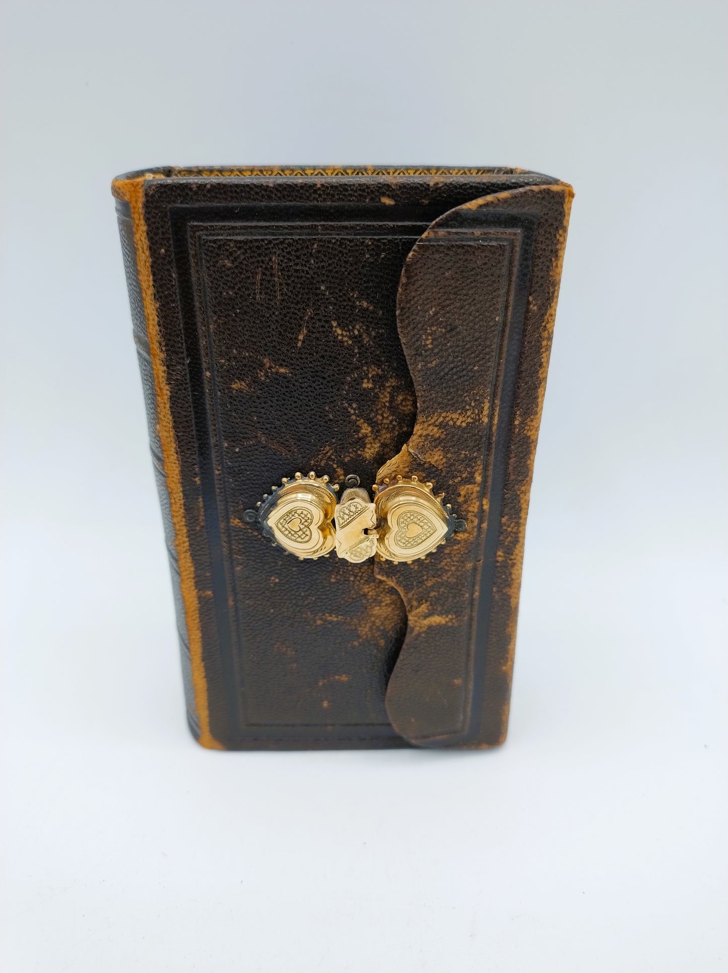 Bible with gold clip lock, 1884
