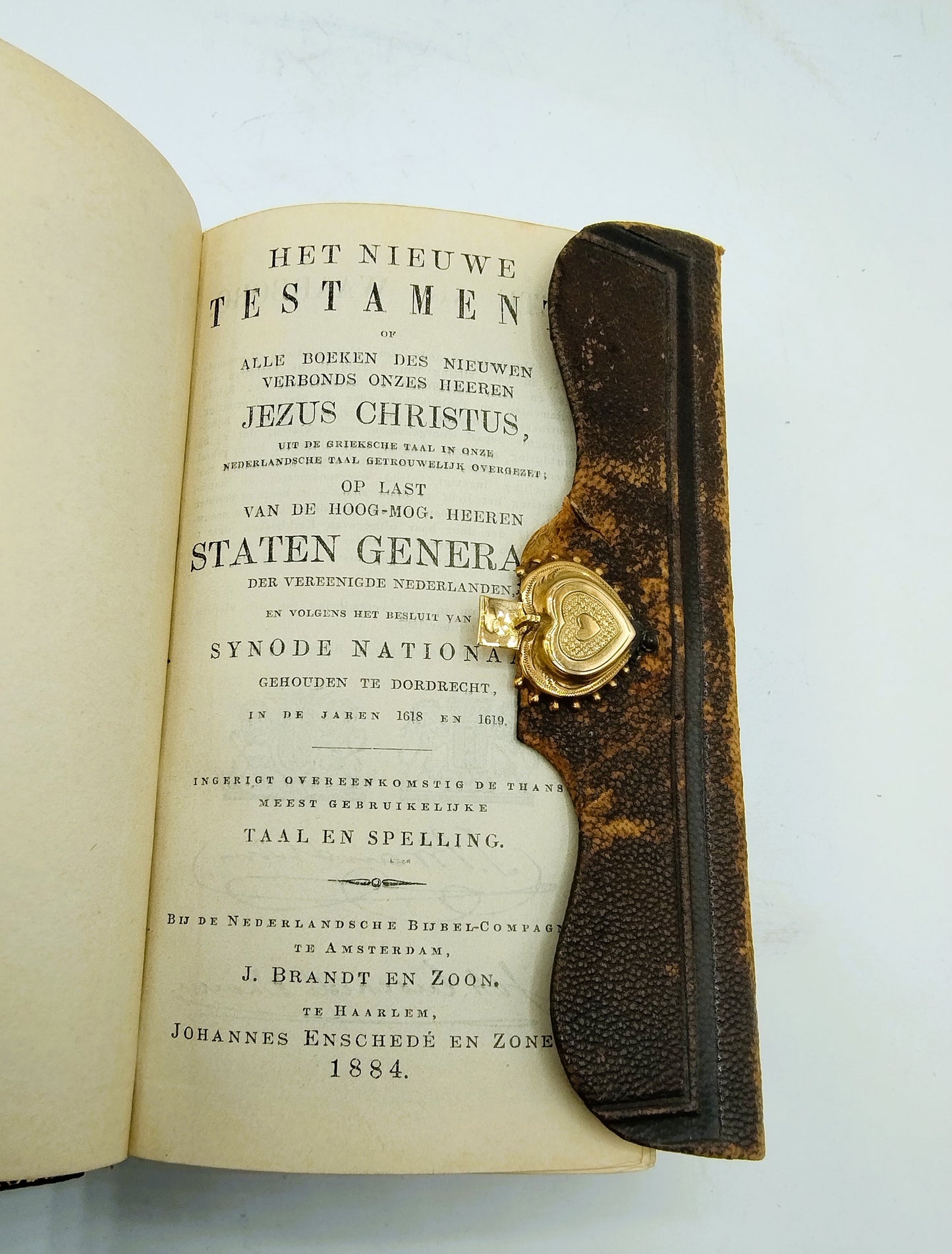 Bible with gold clip lock, 1884