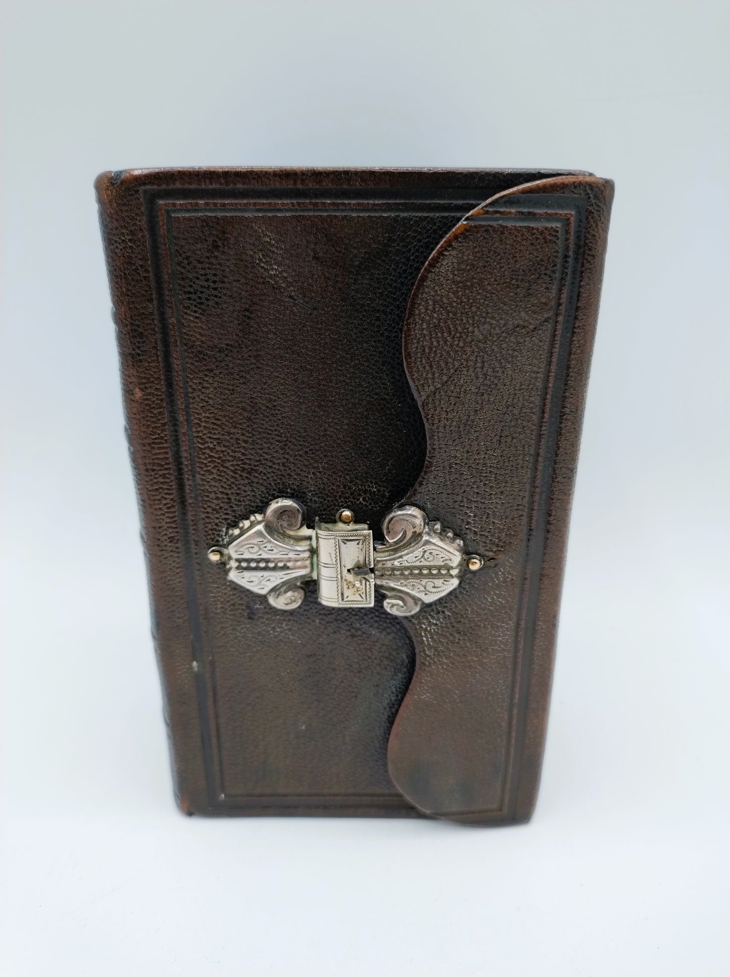 Bible with silver snap lock, 1909