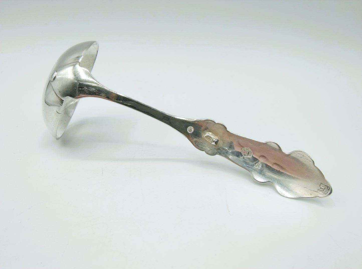 Zilveren roomlepel met eikel, Chr. J. Brunings, Joure, 1891