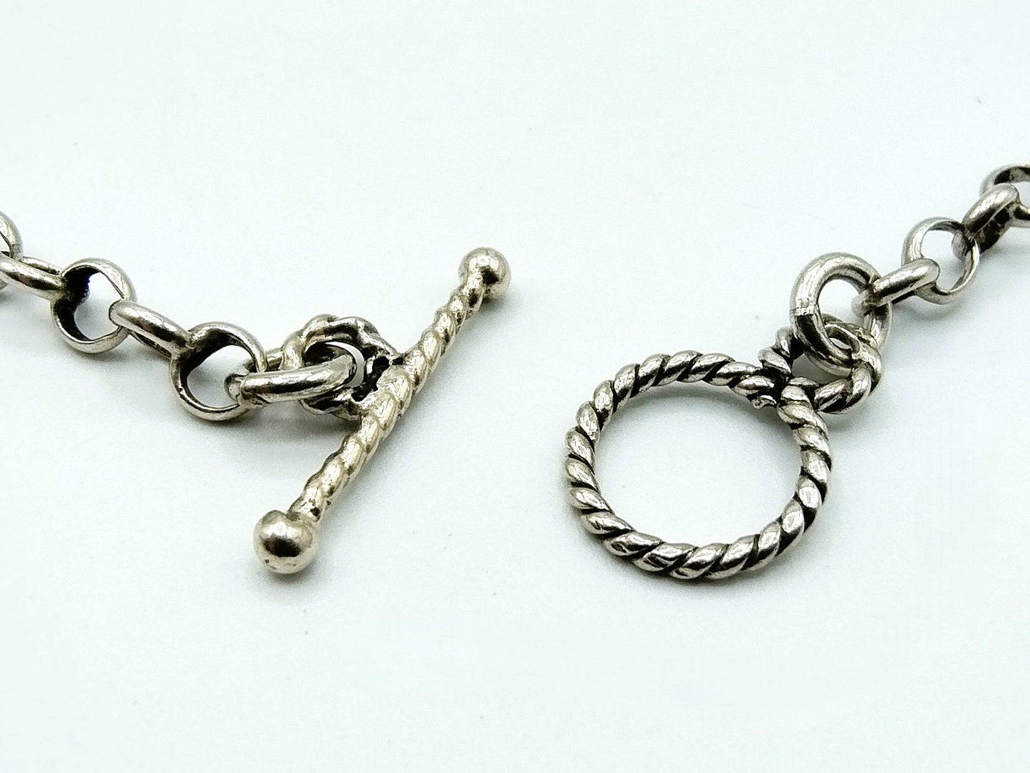 Silver jasseron chain with silver 10 guilder pendant, 73 cm
