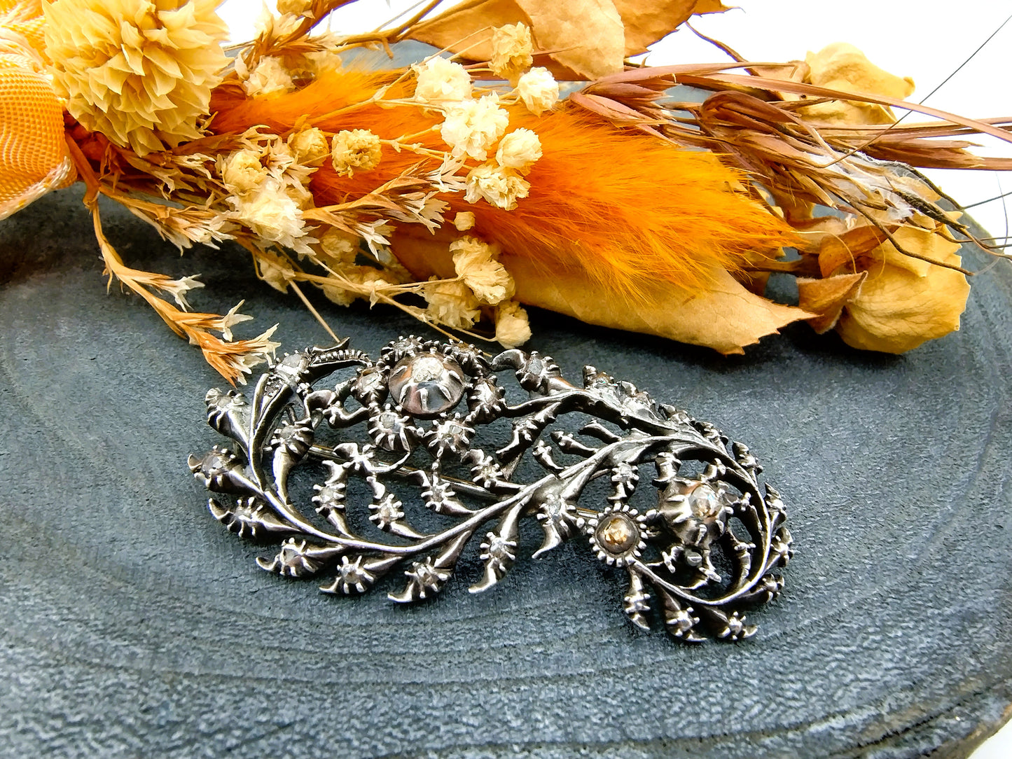 Silver feather brooch set with 19 rose diamonds, 19th century