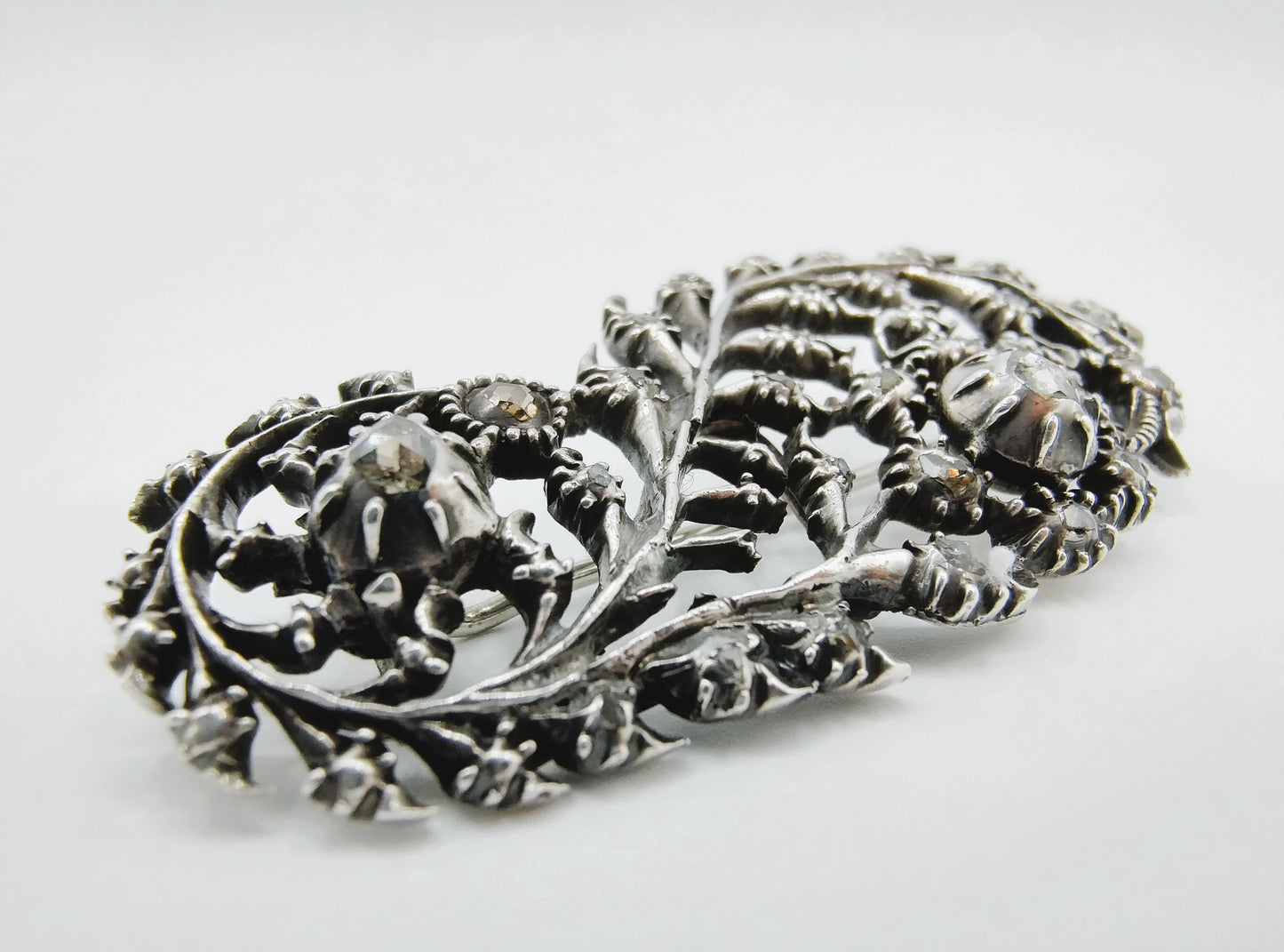 Silver feather brooch set with 19 rose diamonds, 19th century