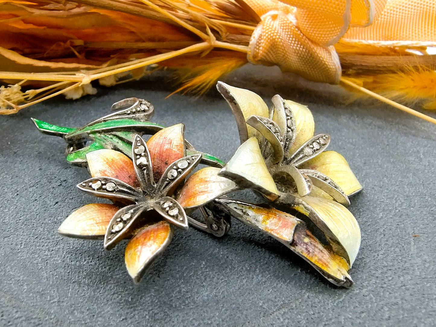 Art Nouveau flower brooch, silver with enamel and marcasites.